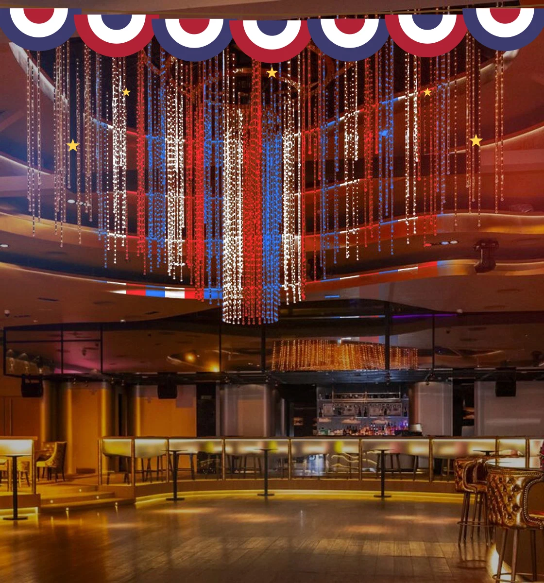 Sala Las Vegas de Madrid con iluminación azul, roja y blanca y guirnalda country americana